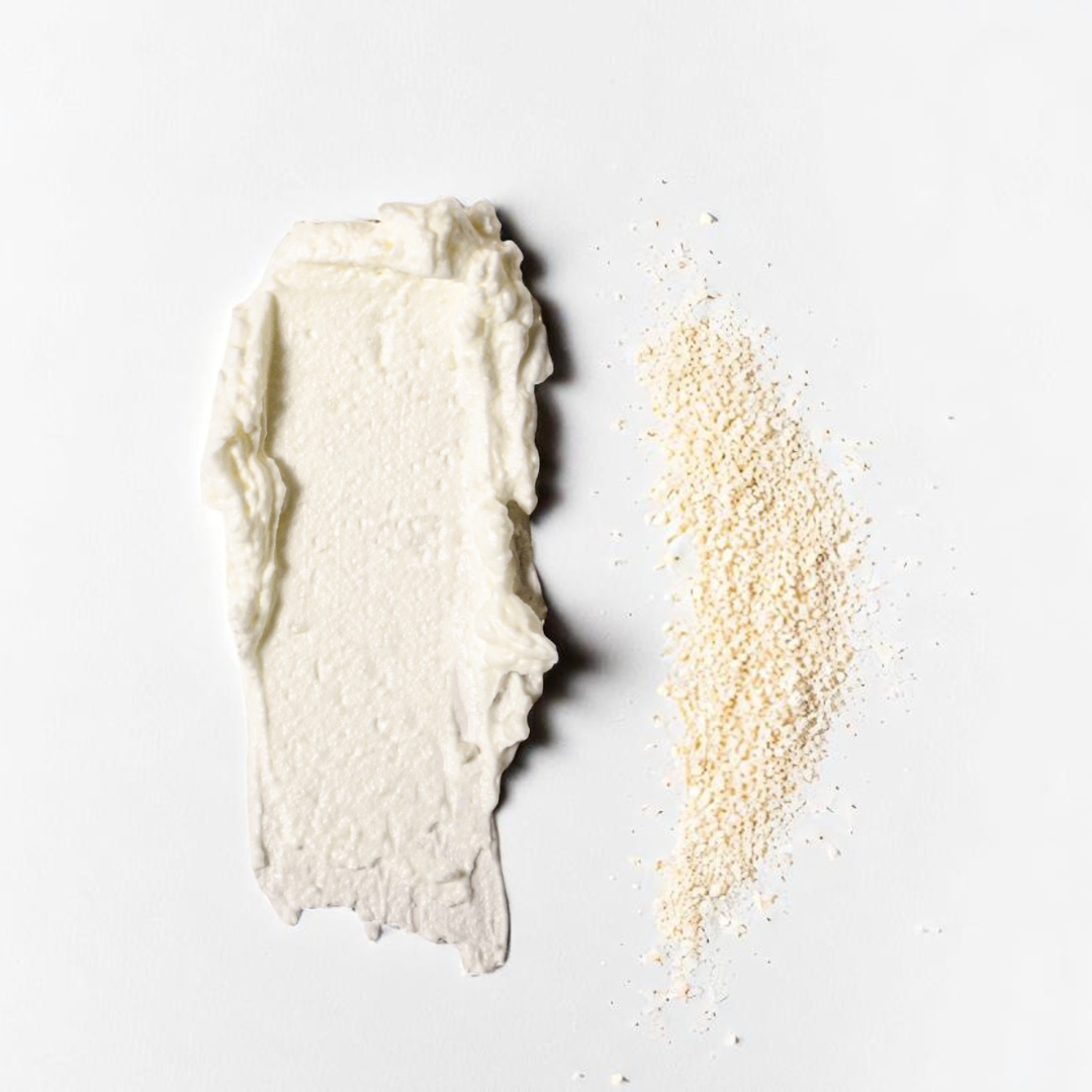 Oat whipped beef tallow texture smear with colloidal oats beside it, showing nourishing formula for sensitive and eczema-prone skin